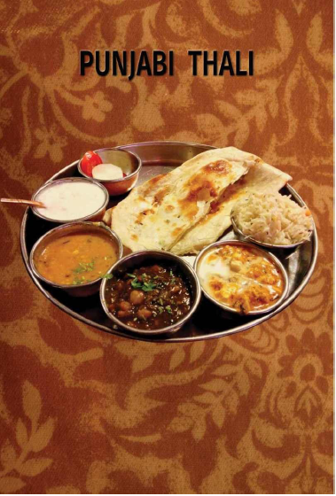 A plate of food on a table
AI-generated content may be incorrect.